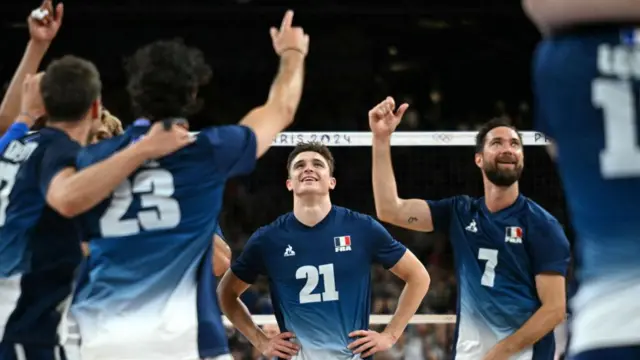 France's #21 Theo Faure and teammates celebrate 