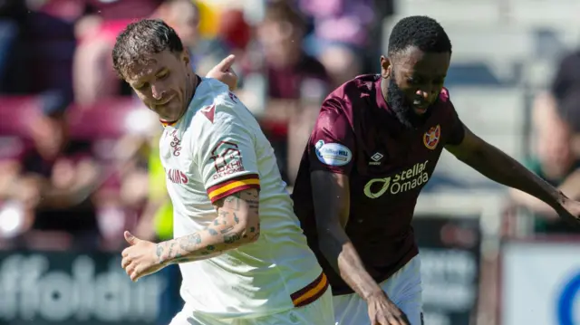 Motherwell's Andy Halliday and Hearts' Beni Baningime