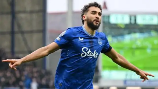 Dominic Calvert-Lewin celebrates scoring for Everton against Tottenham with his arms outstretched