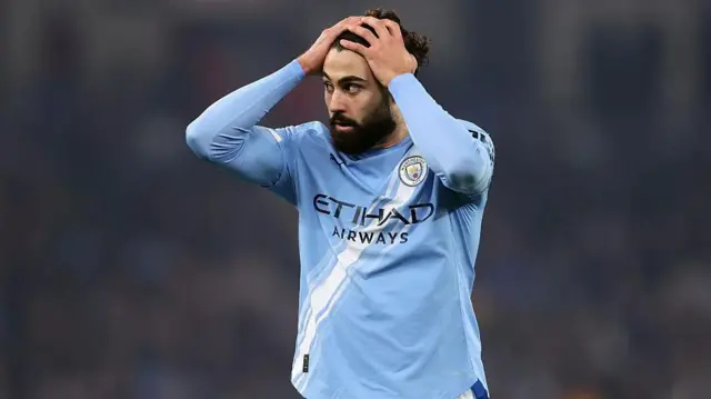 Josko Gvardiol with his hands on his head