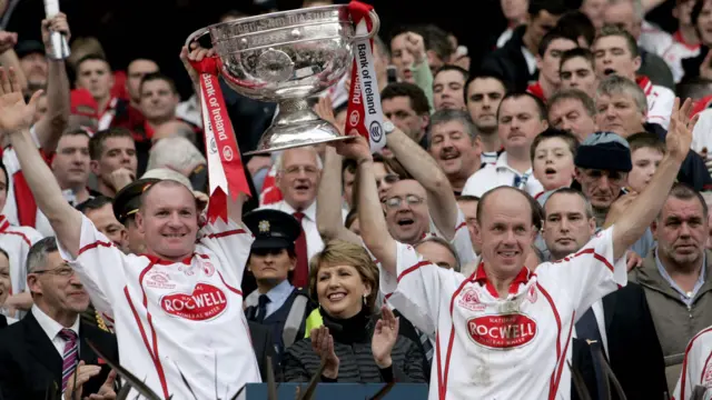 Chris Lawn and Peter Canavan lift the Sam Maguire Cup in 2005