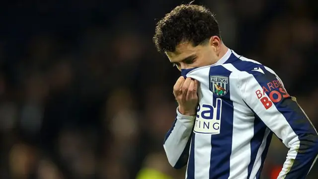 Mikey Johnston looks dejected