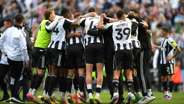 Newcastle players celebrate Champions League qualification