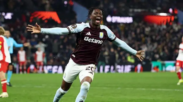 Jamaldeen Jimoh-Aloba celebrates scoring.