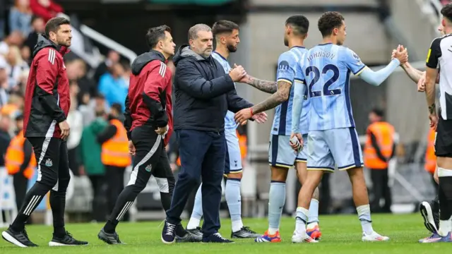 Tottenham Hotspur head coach Ange Postecoglou looks dejected 