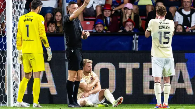 Hearts Stephen Kingsley goes off with a shoulder injury during a UEFA Europa League play-off match between FC Viktoria Plzen and Heart of Midlothian at the Doosan Arena, on August 22, 2024, in Plzen, Czech Republic.  