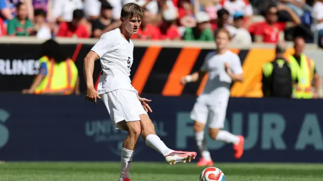 David Moller Wolfe, wearing Norway's white third kit, in action against Morocco on 7 June