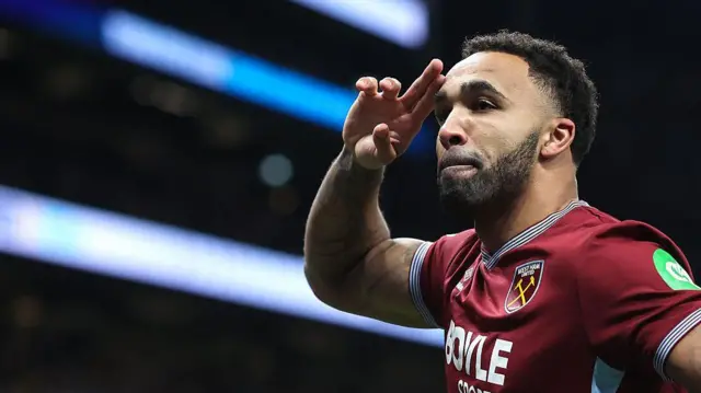 Wilson celebrates after scoring against Tottenham