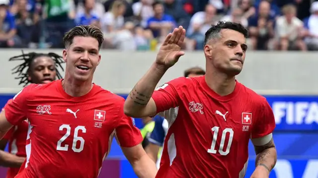 Granit Xhaka celebrates a goal for Switzerland