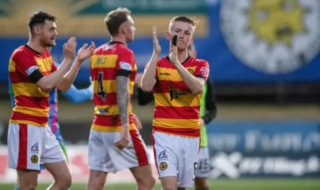 Partick Thistle's Kyle Turner applauds the fans after beating Ross County