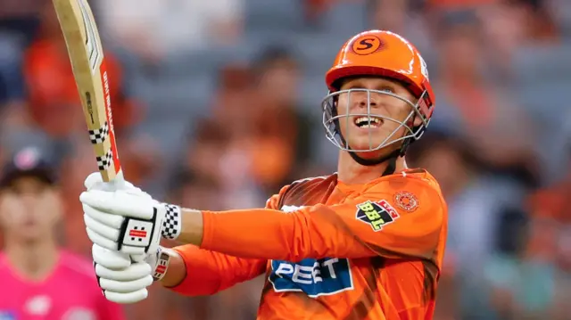 Cooper Connolly hits a six for Perth Scorchers in their opening BBL win over Sydney Sixers