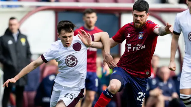 Hearts' Macaulay Tait and Kilmarnock's Liam Donnelly