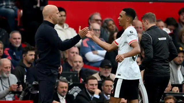 Arne Slot and Trent Alexander-Arnold