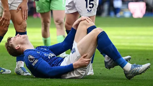 Jarrad Branthwaite lays injured on the pitch