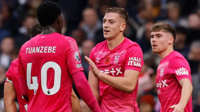 Liam Delap is congratulated by his Ipswich team-mates after scoring against Tottenham