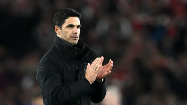 Mikel Arteta applauds after match