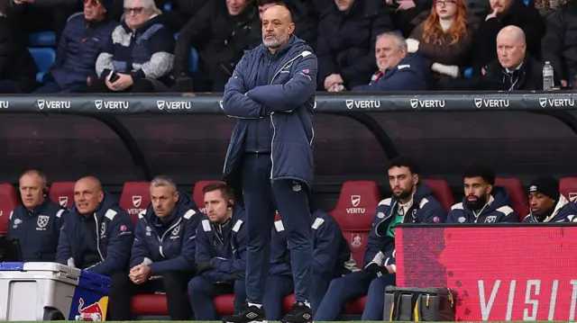 Nuno Espirito Santo looks on from the touchline at Turf Moor
