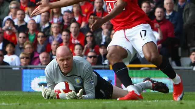 Brad Friedel collects ball against Manchester United