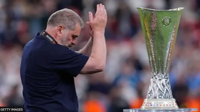 Ange Postecoglou and the Europa League trophy 
