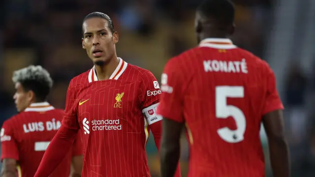 Virgil van Dijk looks towards Ibrahima Konate