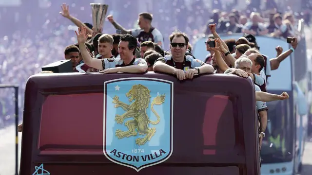 Unai Emery at the front of the parade bus