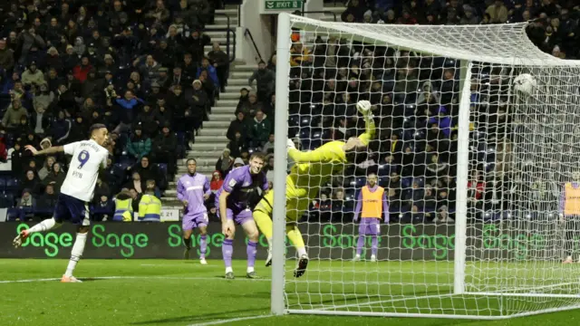 Daniel Jebbison watches as his header goes past Sheffield United goalkeeper and towards the net