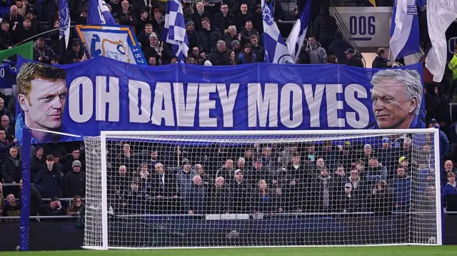 A banner that reads 'Oh Davey Moyes' being held up by fans at Hill Dickinson Stadium