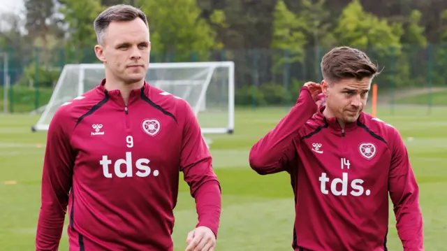 Devlin, right, is set to follow Shankland in leaving Hearts