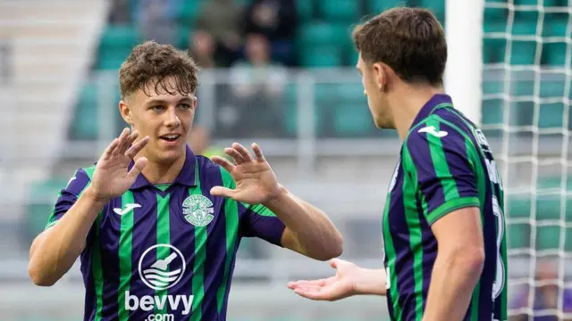 Rudi Molotnikov celebrates with Josh Campbell