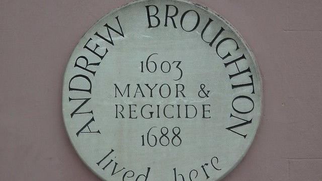 A circular white plaque in Maidstone commemorating Andrew Broughton former mayor