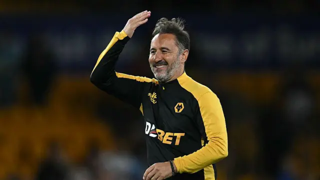 Vitor Pereira celebrates on the pitch