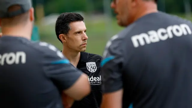 A photo of Andrew Nestor wearing a black West Bromwich Albion shirt at a football training camp in July