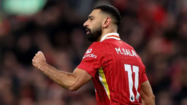 Mohamed Salah of Liverpool celebrates scoring his team's second goal during the Premier League match between Liverpool FC and Brighton & Hove Albion FC at Anfield