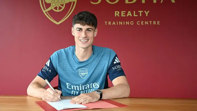 Kepa Arrizabalaga signing his Arsenal contract