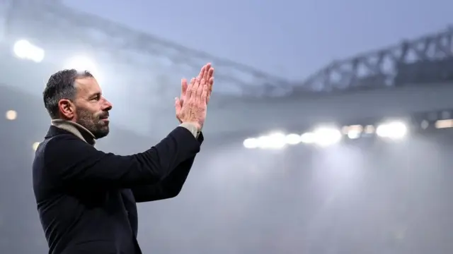 Ruud van Nistelrooy applauds fans after final match in temporary charge at Old Trafford