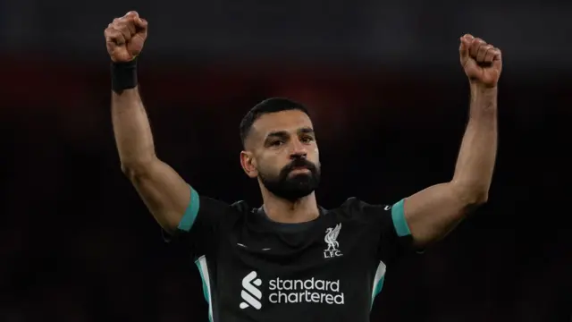 Mohamed Salah celebrates his late equaliser for Liverpool during the Premier League match between Arsenal FC and Liverpool FC at Emirates Stadium