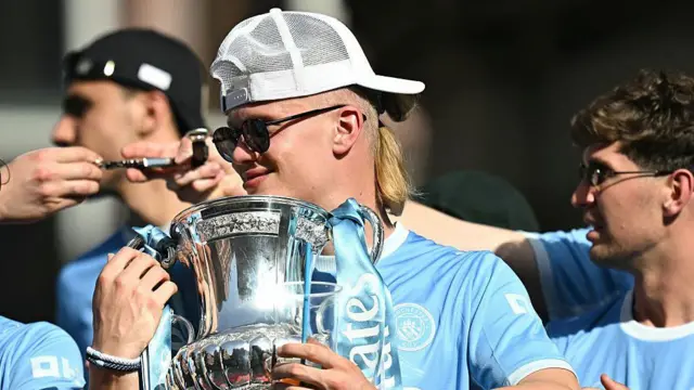 Erling Haaland with the FA Cup trophy
