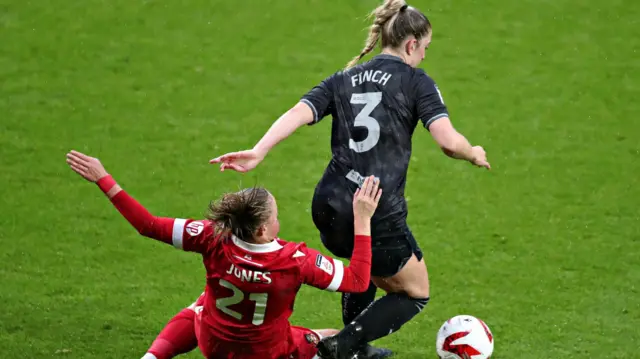 Wrexham's Lili Jones tackles Swansea's Lucy Finch during the Genero Adran Premier game on 29 September