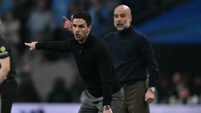 Arsenal boss Mikel Arteta and Manchester City boss Pep Guardiola gesturing on the sidelines