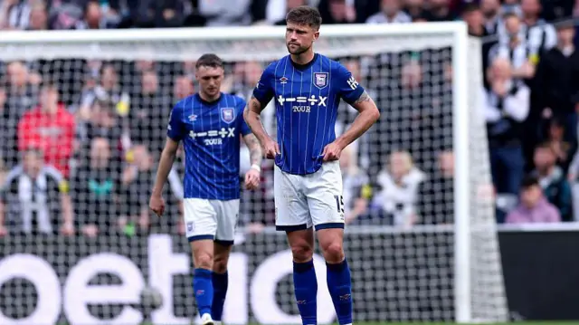 Cameron Burgess of Ipswich Town and teammates