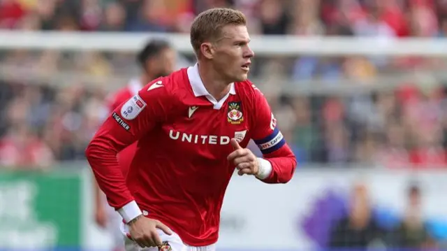 Wrexham captain James McClean in action against Northampton Town