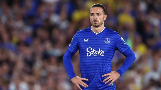 Jack Grealish looks on for Everton