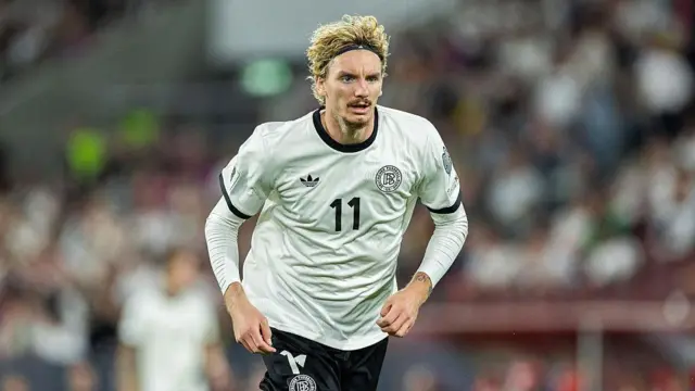 Nick Woltemade of Germany in action