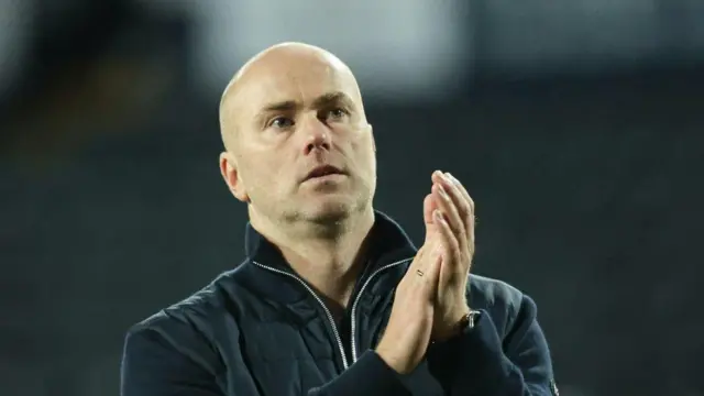 Motherwell manager Jens Berthel Askou applauds the travelling support at Rugby Park. 