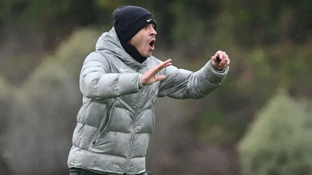 Liam Rosenior coaches during training at Chelsea