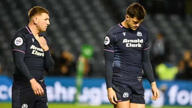 Finn Russell is Blair Kinghorn às dèidh a' gheama.