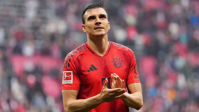 Joao Palhinha of Bayern Munich applauds the fans after the Bundesliga match between RB Leipzig and FC Bayern München at Red Bull Arena 
