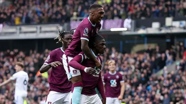 Loum Tchaouna celebrates with Jaidon Anthony and Lesley Ugochukwu after scoring a stunning goal for Burnley against Leeds United at Turf Moor