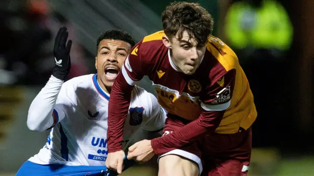 Rangers' Hamza Igamane and Motherwell's Tom Sparrow