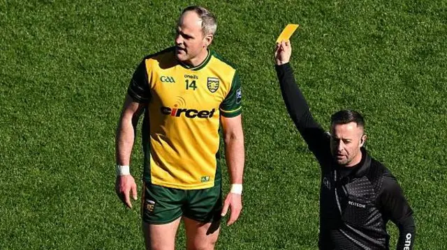 Michael Murphy is shown a yellow card